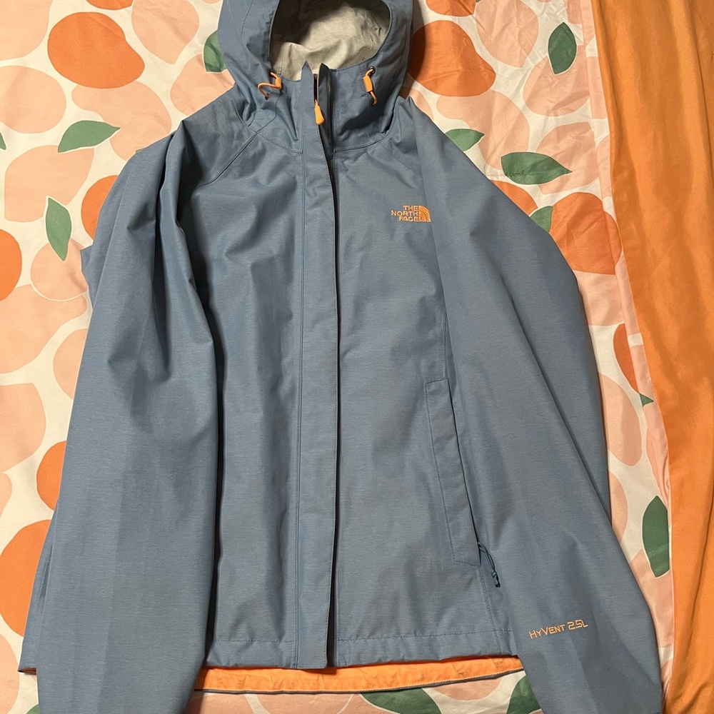 Women’s north face rain coat - blue grey with orange accents - small - used
